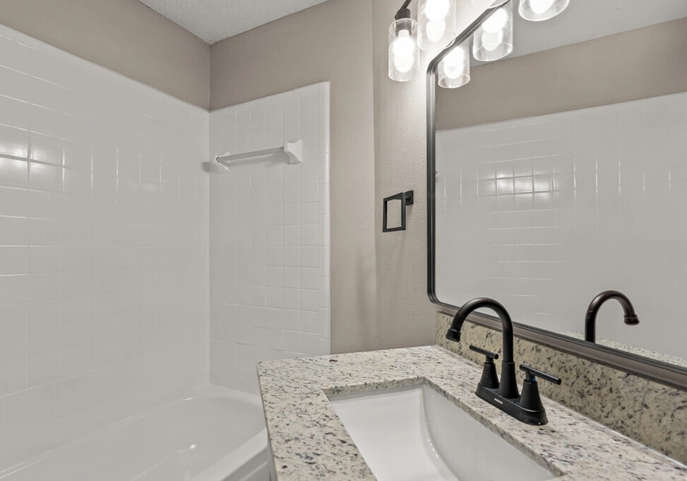 Modern bathroom with granite vanity